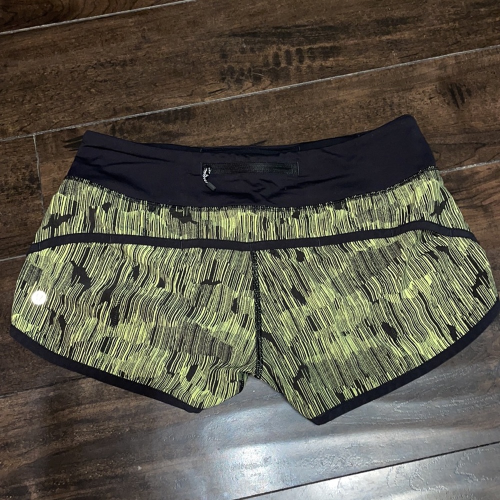 Black and yellow Lululemon Speed Shorts - Picture 2 of 4